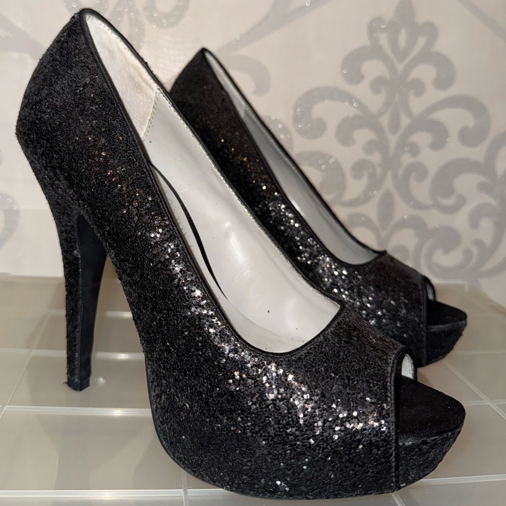 Black high heels with peep toe glitter detail